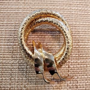 Vintage goldtone swirl brooch